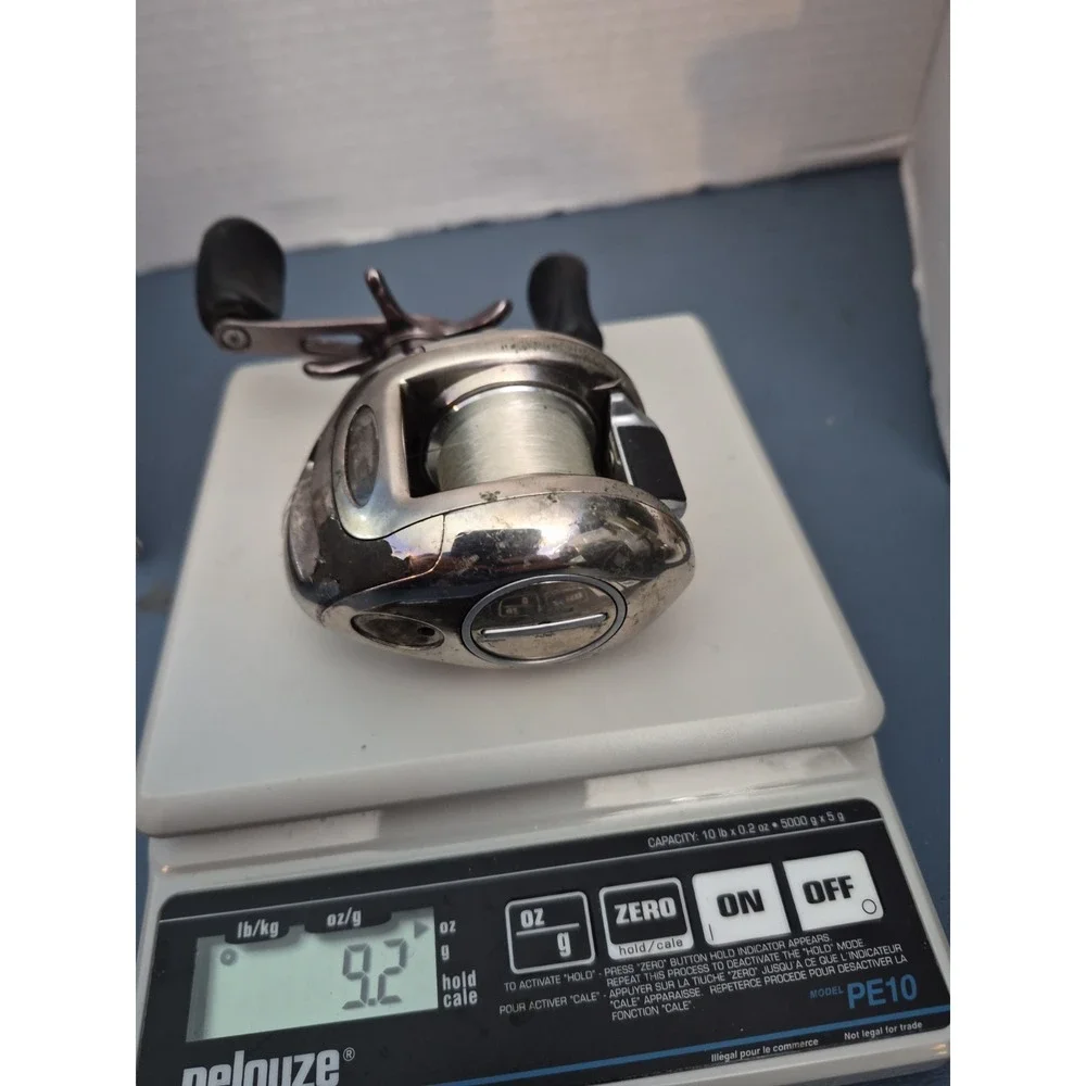Bass PRO SHOPS JOHNNY MORRIS BAITCAST REEL FISING REEL USED